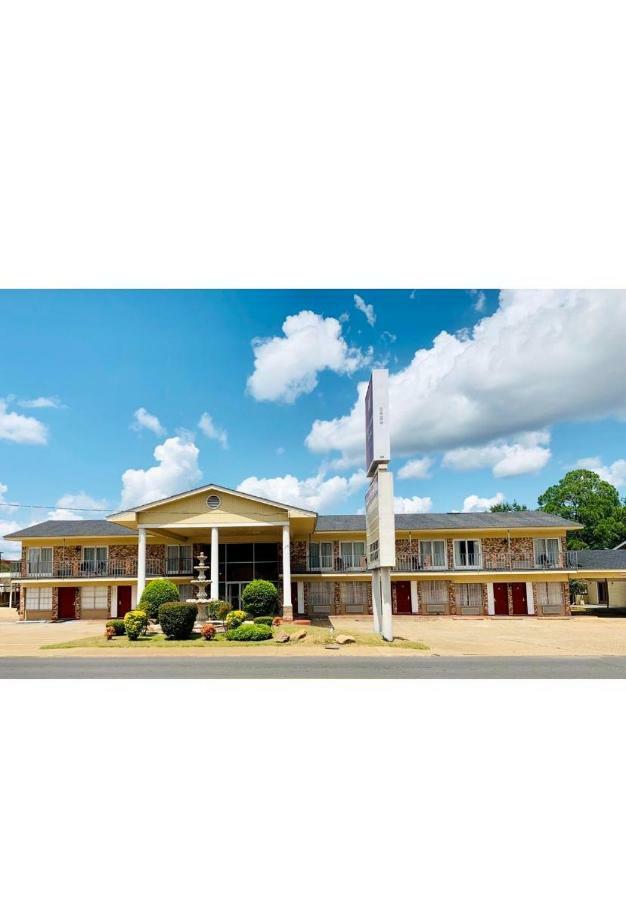 Coachman'S Inn Magnolia Exterior photo